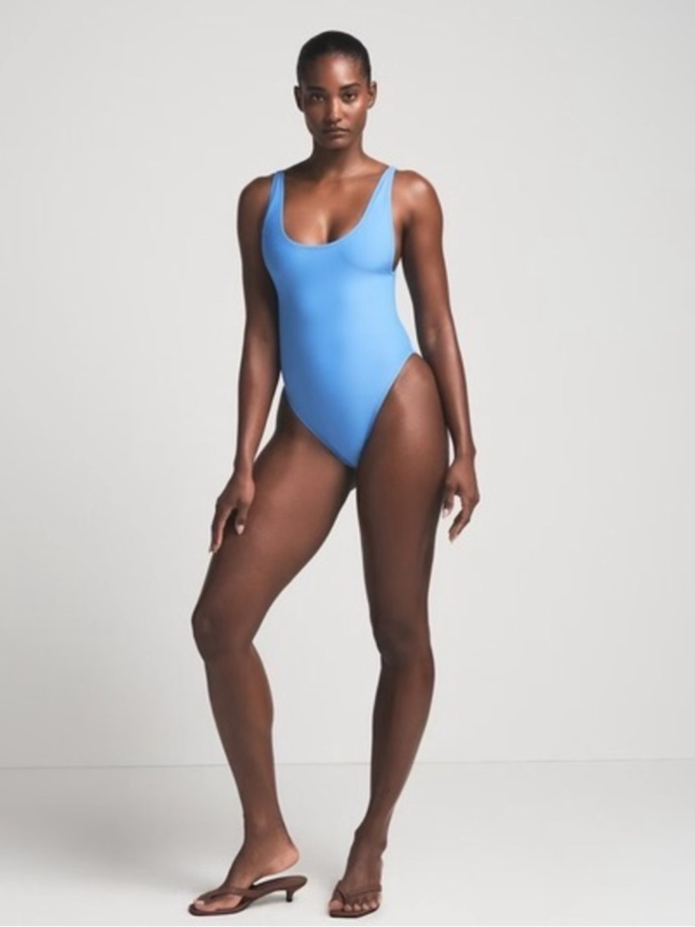 Skims signature swim scoop neck one piece
Color tide NWT size XL